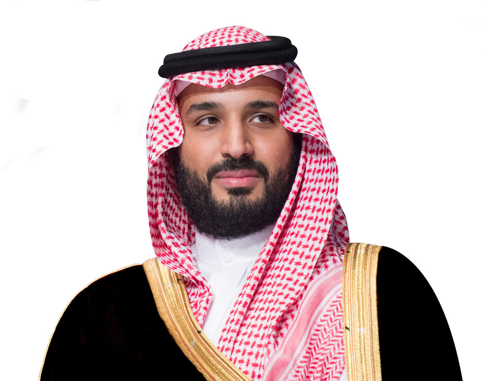 الأمير محمد بن سلمان،  ولي العهد السعودي ورئيس مجلس إدارة شركة البحر الأحمر الدولية، يقف شامخًا مرتديًا الشماغ والبشت الأسود، مجسدًا القيادة والمسؤولية.